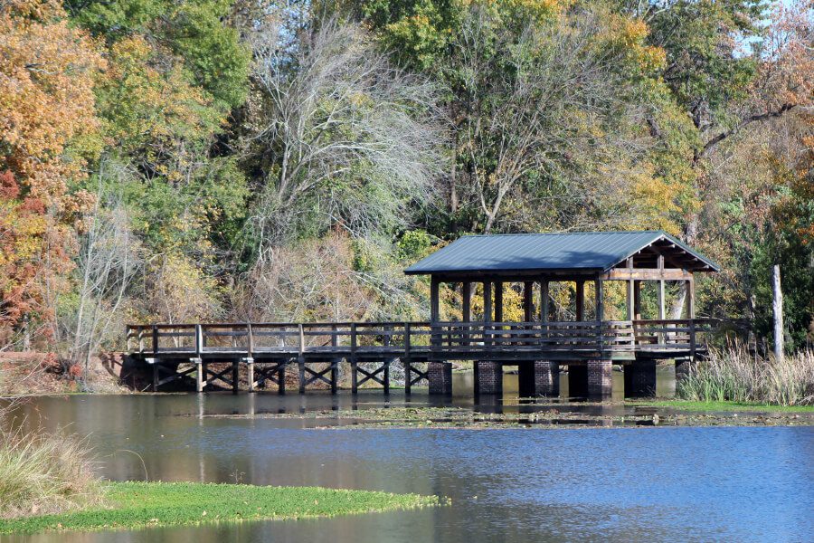North Augusta - Wooden Bridge with Roof ontop of Blue River
